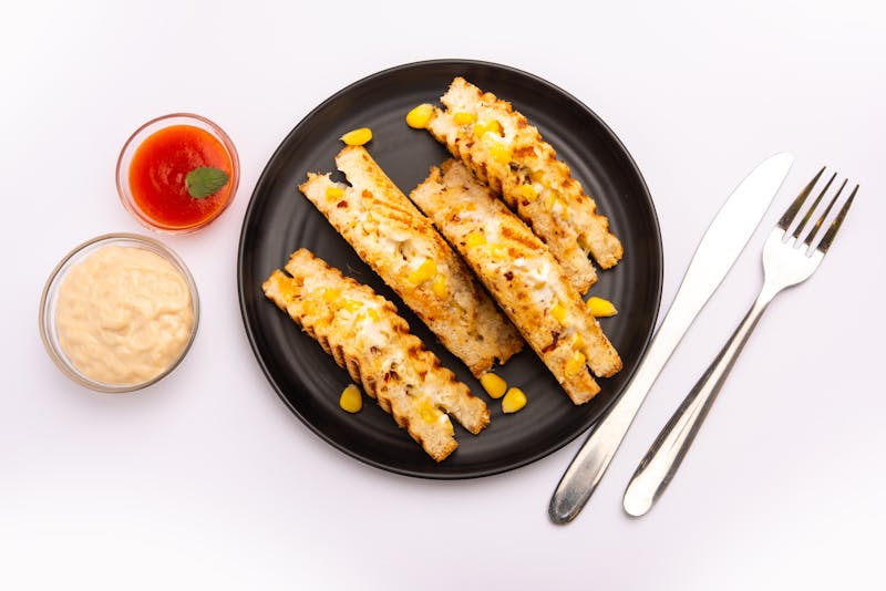 Cheesy breadsticks with dipping sauce